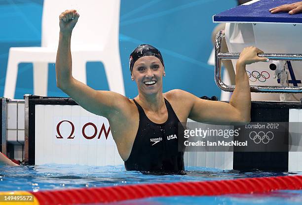 Dana Vollmer of the United States celebrates after winning the gold medal and setting a new world record in the Womans 100m Butterfly during the 2012...