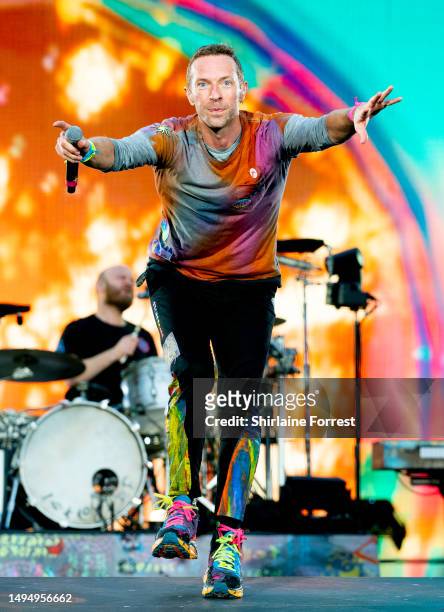 Chris Martin of Coldplay performs at Etihad Stadium on May 31, 2023 in Manchester, England.