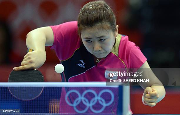 Ai Fukuhara of Japan returns a shot to Anna Tikhomirova of Russia during a table tennis women's singles round match of the London 2012 Olympic Games...