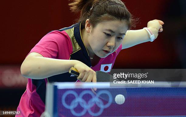 Ai Fukuhara of Japan returns a shot to Anna Tikhomirova of Russia during a table tennis women's singles round match of the London 2012 Olympic Games...