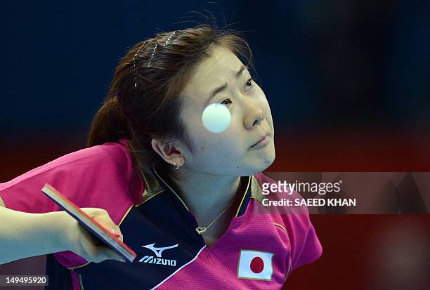 Ai Fukuhara of Japan serves to Anna Tikhomirova of Russia during a table tennis women's singles round match of the London 2012 Olympic Games at the...