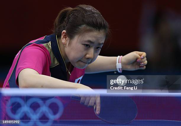 Ai Fukuhara of Japan plays a backhand in her Women's Singles Table Tennis third round match against Anna Tikhomirova of Russia on Day 2 of the London...