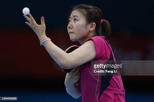 Ai Fukuhara of Japan serves in her Women's Singles Table Tennis third round match against Anna Tikhomirova of Russia on Day 2 of the London 2012...