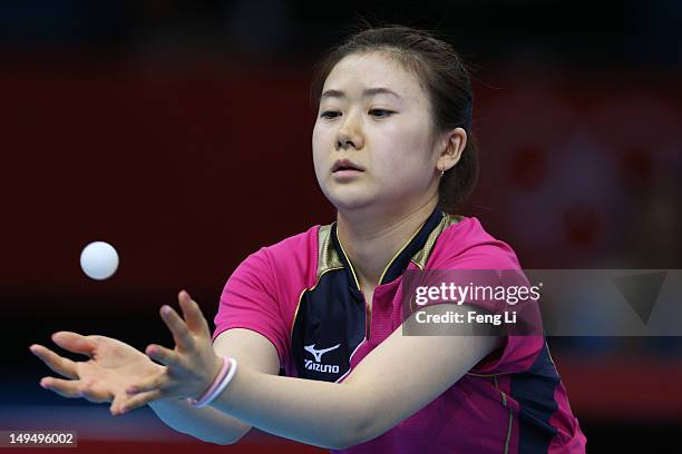 Ai Fukuhara of Japan catches the ball in her Women's Singles Table Tennis third round match against Anna Tikhomirova of Russia on Day 2 of the London...