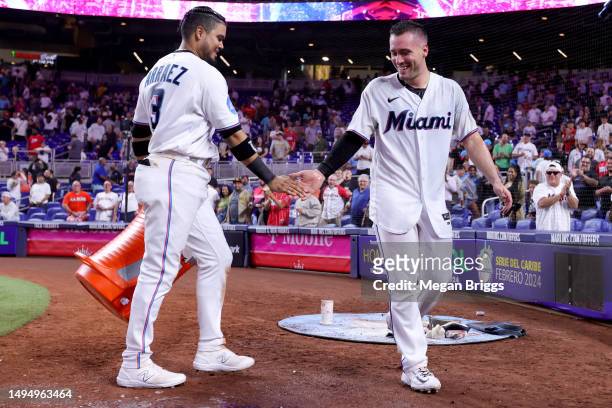 Luis Arraez and Nick Fortes of the Miami Marlins celebrate after defeating the San Diego Padres at loanDepot park on May 31, 2023 in Miami, Florida.
