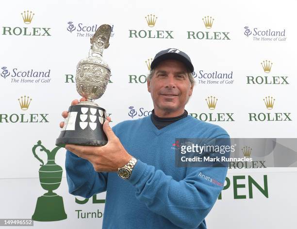 Fred Couples of the United States gets his hands on Senior Open Claret Jug after winning the Senior Open Championship played over the Ailsa course at...