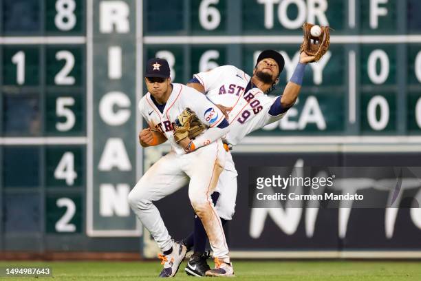 Corey Julks of the Houston Astros makes a catch on a fly hit by Edouard Julien of the Minnesota Twins during the ninth inning at Minute Maid Park on...