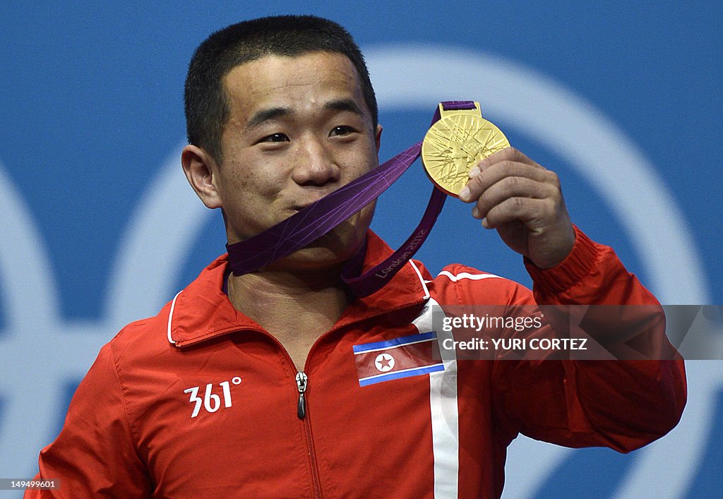 North Korea's Om Yun Chol celebrates wit