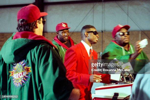 Professional NFL and MLB player Deion Sanders, on both the Atlanta Braves and Atlanta Falcons teams, is ready to be filmed in a red suit surrounded...