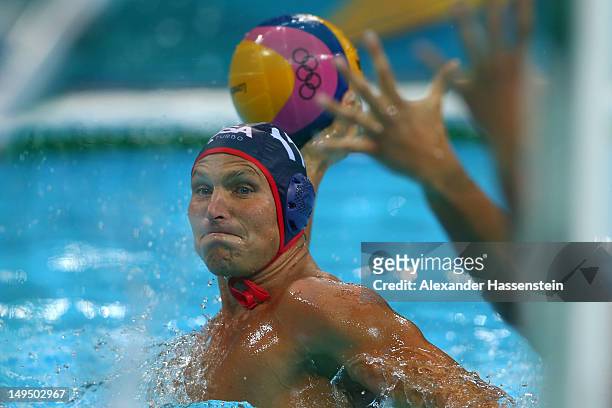 Jesse Smith of United States throws in the Men's Water Polo Preliminary Round Group B match between the United States and Montenegro on Day 2 of the...