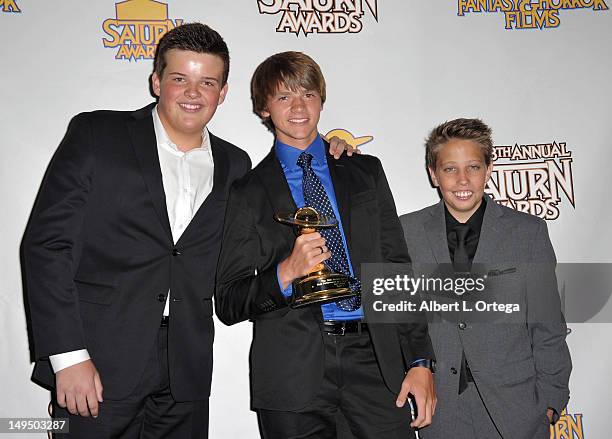 Actor Riley Griffiths, actor Joel Courtney and actor Ryan Lee at the 38th Annual Saturn Awards inside the press room held at Castaways on July 26,...