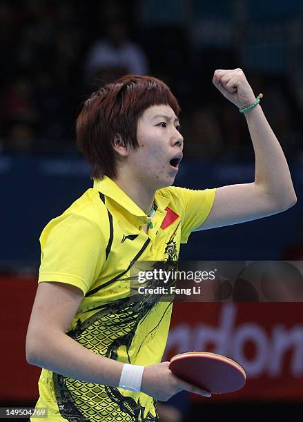 Xiaoxia Li of China celebrates winning her Women's Singles Table Tennis third round match against Ariel Hsing of the United States on Day 2 of the...