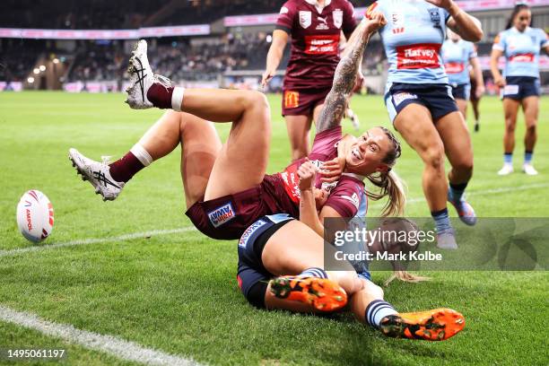 Julia Robinson of the Maroons celebrates scoring a try during game one of the Women's State of Origin series between New South Wales and Queensland...
