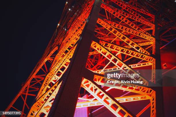 the famous tokyo tower  special lighting colors at night . - japanese stock pictures, royalty-free photos & images