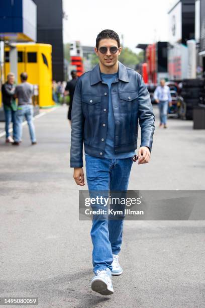 Alpine F1 team driver Esteban Ocon enters the paddock during previews ahead of the F1 Grand Prix of Spain at Circuit de Barcelona-Catalunya on June...