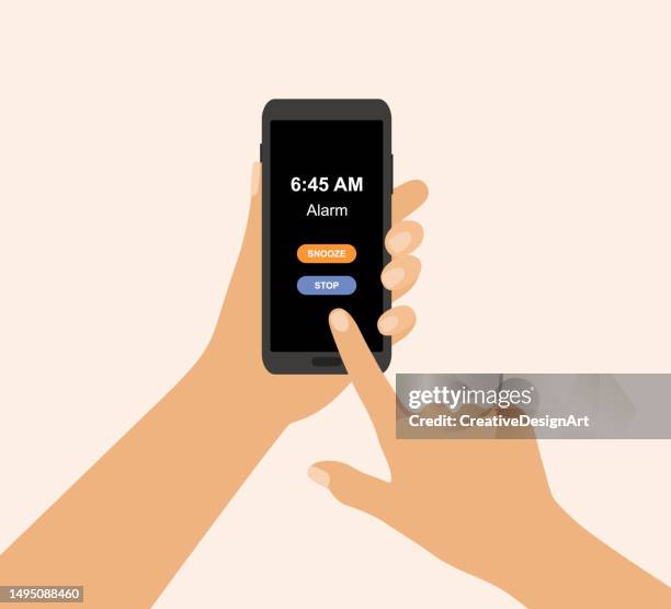 bildbanksillustrationer, clip art samt tecknat material och ikoner med smartphone with alarm clock app, snooze and stop buttons on screen. hand holding smartphone - väckarklocka