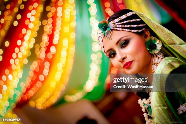 bride - indian bridal makeup stock pictures, royalty-free photos & images