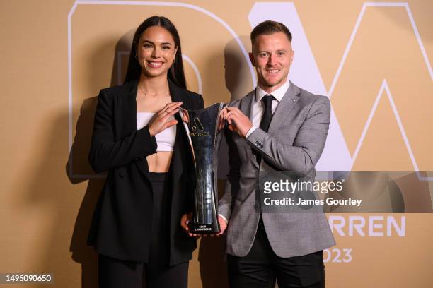 Emma Checker of Melbourne City and Scott Jamieson of Melbourne City pose with the A-Leagues Club Championship Trophy at the 2023 Dolan Warren Awards...