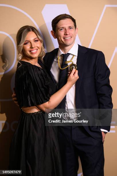 Katelyn Timmings and Craig Goodwin of Adelaide United pose with the Johnny Warren Medal at the 2023 Dolan Warren Awards at The Star on June 01, 2023...