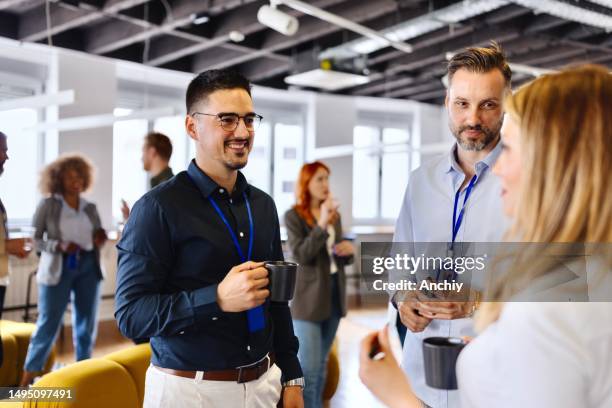 business people networking in the modern space - wellbeing at work stock pictures, royalty-free photos & images