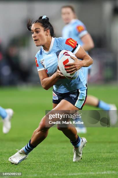Yasmin Clydsdale of the Blues runs the ball during game one of the Women's State of Origin series between New South Wales and Queensland at CommBank...
