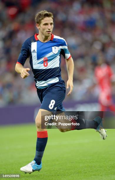 Joe Allen of Team GB in action during the Men's Football first round Group A Match between Great Britain and United Arab Emirates on Day 2 of the...