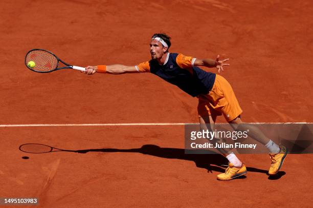 Daniel Altmaier of Germany plays a forehand against Jannik Sinner of Italy during the Men's Singles Second Round match on Day Five of the 2023 French...