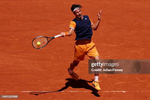 Daniel Altmaier of Germany plays a forehand against Jannik Sinner of Italy during the Men's Singles Second Round match on Day Five of the 2023 French...