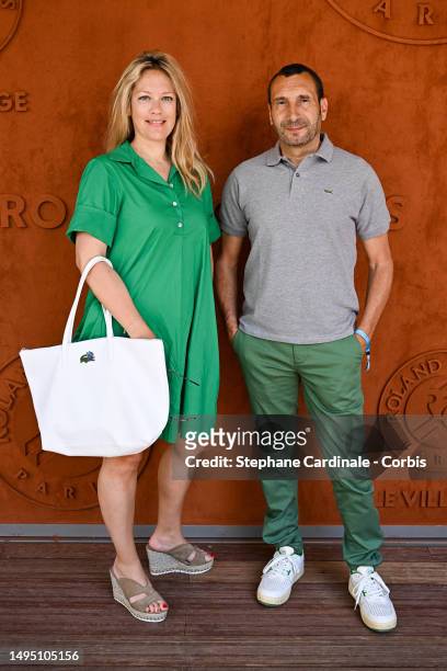 Caroline Faindt and Zinedine Soualem attend the 2023 French Open at Roland Garros on June 01, 2023 in Paris, France.