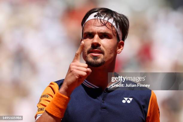 Daniel Altmaier of Germany celebrates a point against Jannik Sinner of Italy during the Men's Singles Second Round match on Day Five of the 2023...