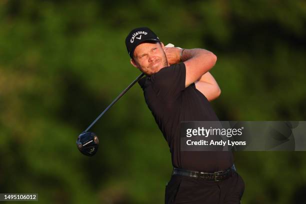 Danny Willett of England hits a tee shot on the first hole during the first round of the Memorial Tournament presented by Workday at Muirfield...
