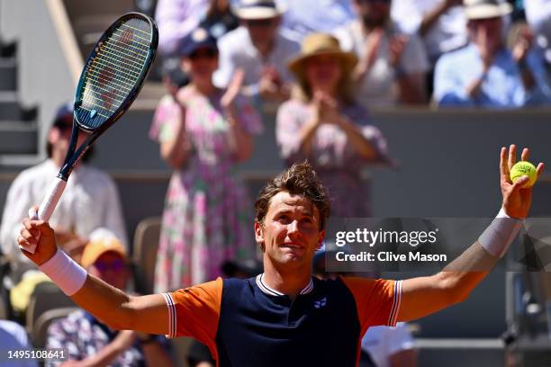 Casper Ruud of Norway celebrates winning match point against Giulio Zeppieri of Italy during the Men's Singles Second Round match on Day Five of the...