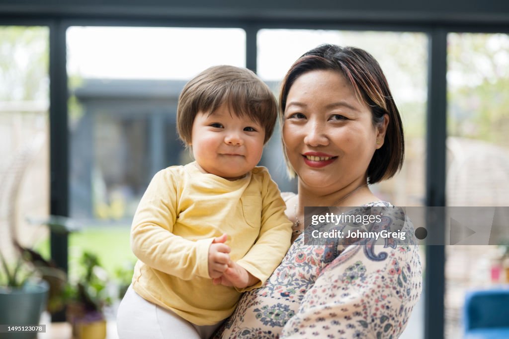 Mature woman and 12-month old baby boy