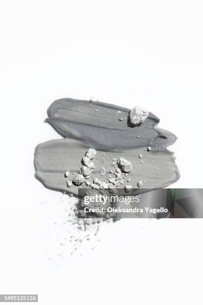 cosmetic swatches of dry and wet clay. the texture of the face mask. beautiful different grey shades of strokes. the samples of clay powder. - mud therapy stock pictures, royalty-free photos & images