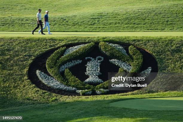 Patrick Rodgers and Denny McCarthy of the United States walk off the 12th tee during the first round of the Memorial Tournament presented by Workday...