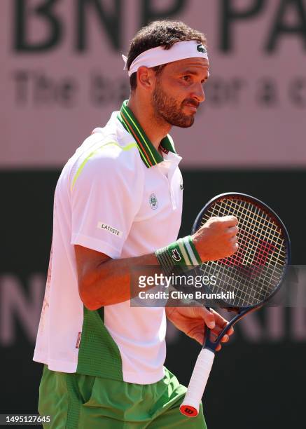Grigor Dimitrov of Bulgaria celebrates a point against Emil Ruusuvuori of Finland during the Men's Singles Second Round match on Day Five of the 2023...