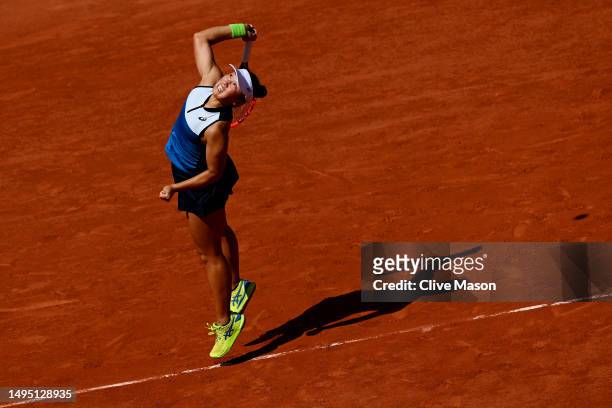 Claire Liu of United States serves against Iga Swiatek of Poland during the Women's Singles Second Round match on Day Five of the 2023 French Open at...