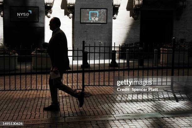 People walk outside of the New York Stock Exchange on June 01, 2023 in New York City. Despite the passing the debt ceiling bill in the U.S. House of...