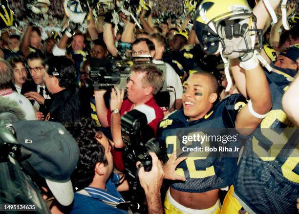 Michigan Wolverines Wide Receiver Kevin Bryant celebrates with teammates after winning Rose Bowl game against Washington State Cougars, January 1,...