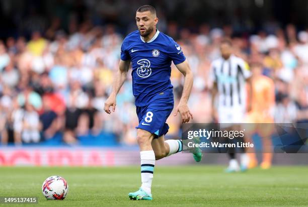 Mateo Kovacic of Chelsea runs with the ball during the Premier League match between Chelsea FC and Newcastle United at Stamford Bridge on May 28,...