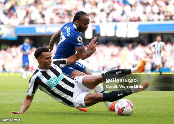 Raheem Sterling of Chelsea is challenged by Jacob Murphy of Newcastle United during the Premier League match between Chelsea FC and Newcastle United...