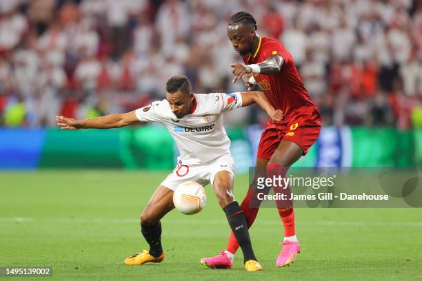 Tammy Abraham of Roma battles for possession with Fernando of Sevilla during the UEFA Europa League 2022/23 final match between Sevilla FC and AS...