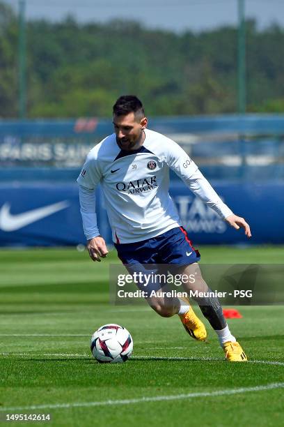 Leo Messi runs with the ball during a Paris Saint-Germain training session at Ooredoo Center on June 01, 2023 in Paris, France.