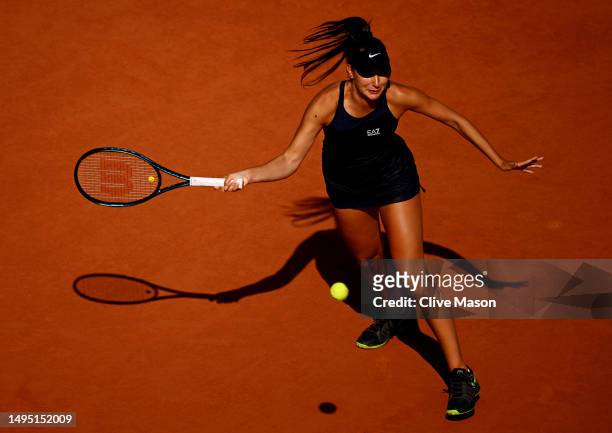 Oceane Dodin of France plays a forehand against Ons Jabeur of Tunisia during the Women's Singles Second Round match on Day Five of the 2023 French...