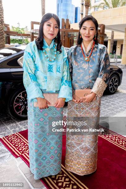 Queen Jetsun of Bhutan and Princess Eeuphelma of Bhutan leave their hotel for the wedding of Crown Prince Al Hussein Bin Abdullah of Jordan on June...