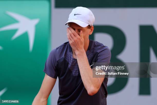 Jannik Sinner of Italy reacts against Daniel Altmaier of Germany during the Men's Singles Second Round match on Day Five of the 2023 French Open at...