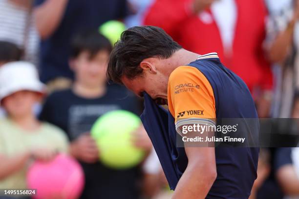 Daniel Altmaier of Germany celebrates emotionally after winning match point against Jannik Sinner of Italy during the Men's Singles Second Round...