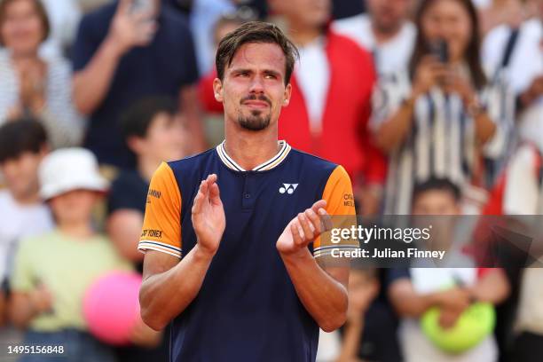 Daniel Altmaier of Germany applauds the crowd with tears in their eyes after winning match point against Jannik Sinner of Italy during the Men's...