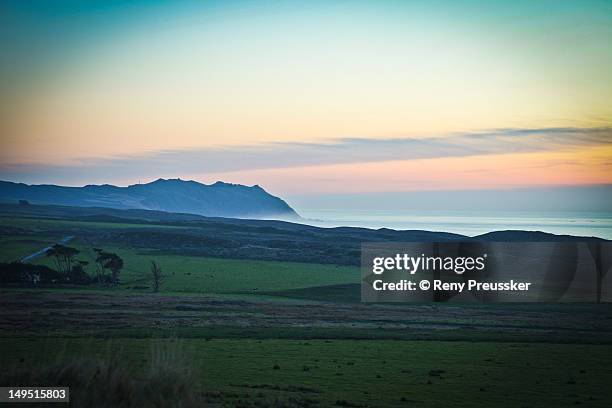 coast at dusk - reny preussker imagens e fotografias de stock