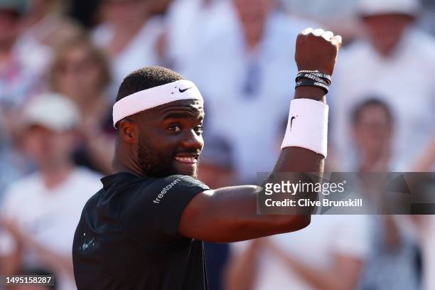 Frances Tiafoe of United States celebrates winning match point against Aslan Karatsev during the Men's Singles Second Round match on Day Five of the...